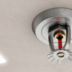A fire sprinkler with a glass bulb, heat-sensitive element.